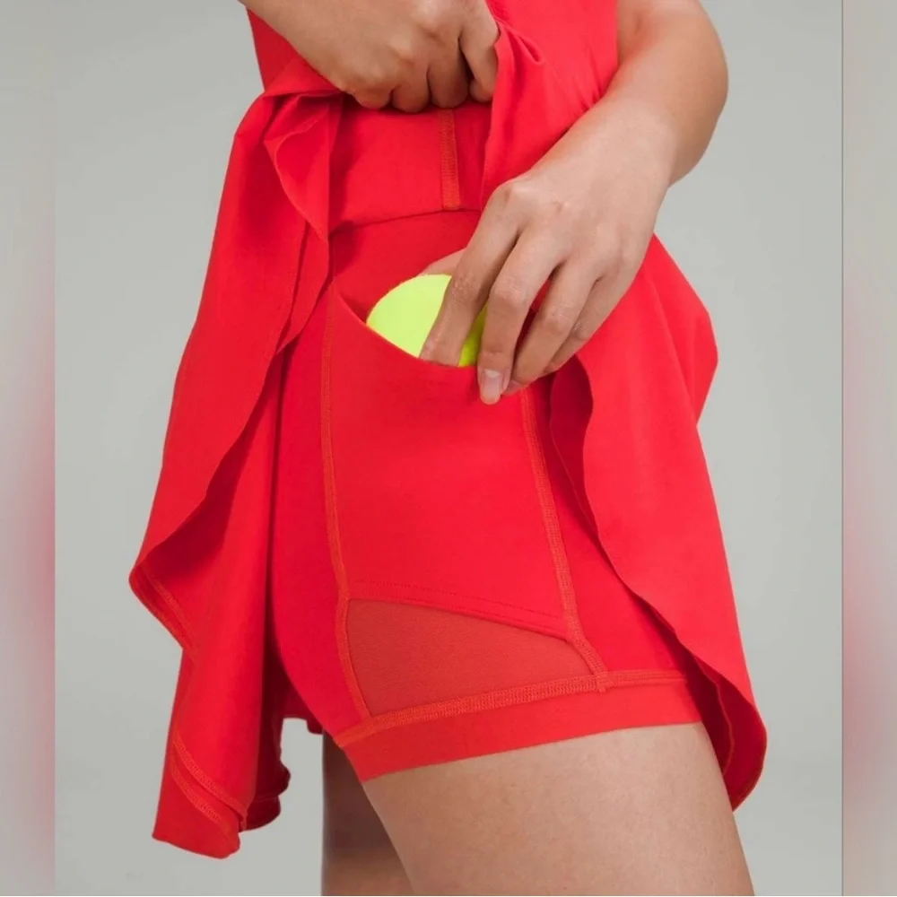 Lululemon Court Rival 14” Skirt in a vibrant Coral color - Picture 2 of 12